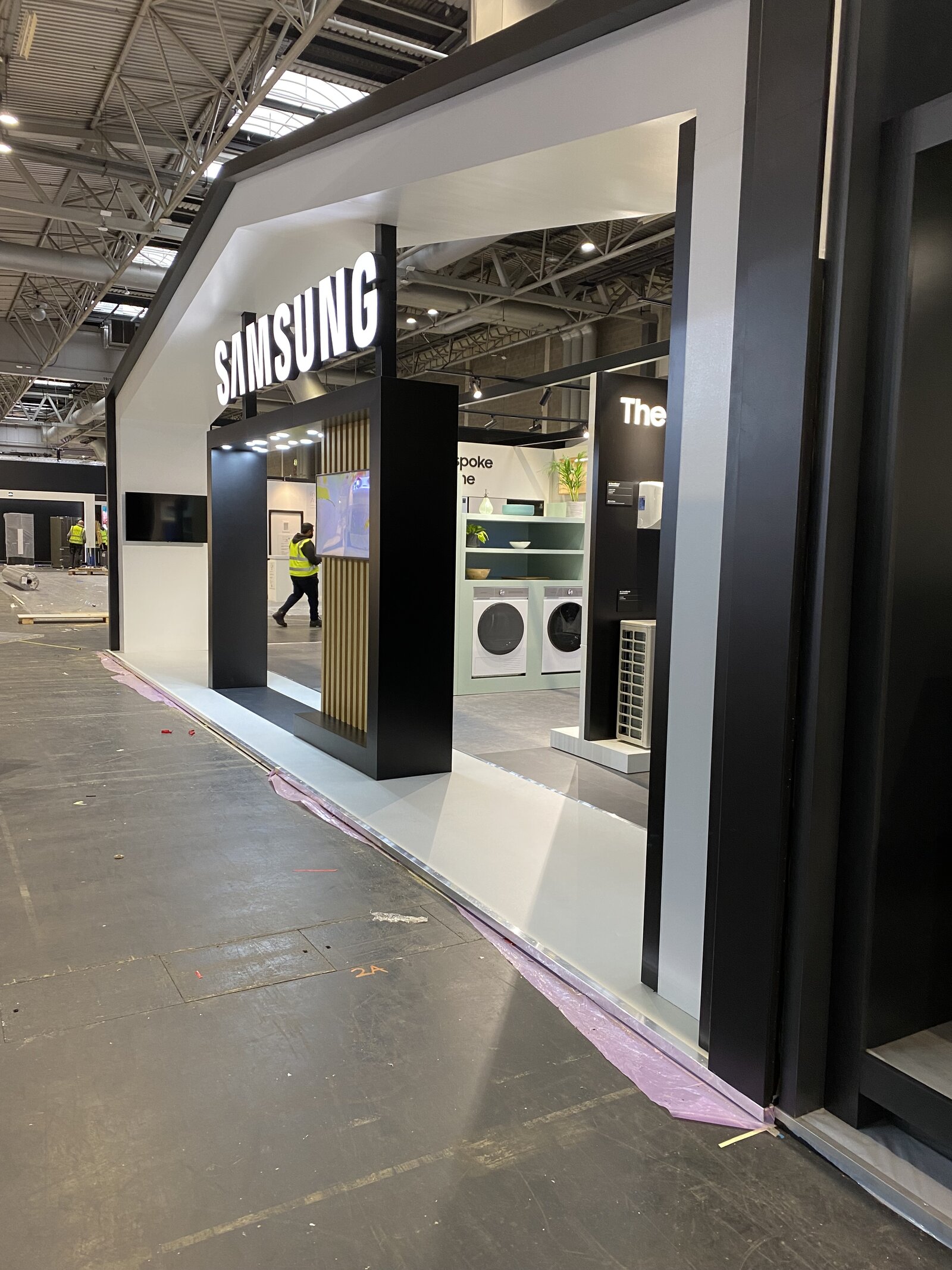 Samsung KBB stand in production — The Frame wall install